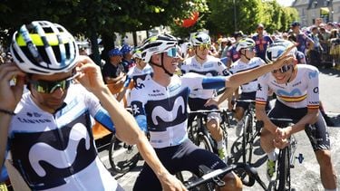 epa12228763 Spanish rider Enric Mas (C) of Movistar Team and Spanish rider Ivan Romeo of Movistar Team (R) during the 6th stage of the Tour de France cycling race over 201.5km from Bayeux to Vire Normandie, France, 10 July 2025.  EPA/MARTIN DIVISEK