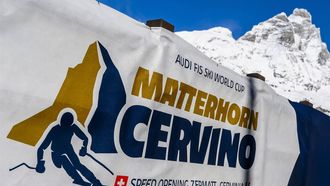 2023-11-15 12:58:11 epa10976028 A logo is pictured front of the Matterhorn at the FIS Alpine Skiing World Cup event between Zermatt in Switzerland and Cervinia in Italy, 15 November 2023. The women's downhill training was cancelled due to strong winds.  EPA/JEAN-CHRISTOPHE BOTT
