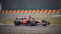 This handout picture released by Ferrari on January 22, 2024 shows F1 driver Lewis Hamilton testing the Ferrari F1SF 75 on the Fiorano circuit, at Maranello. Lewis Hamilton drove a Ferrari Formula One car for the first time today after the seven-time world champion took to the track at the team's test circuit in front of delighted fans. 
Handout / FERRARI / AFP