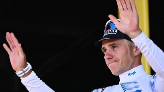 Soudal Quick-Step team's Belgian rider Remco Evenepoel celebrates on the podium with the best young rider's white jersey after the 13th stage of the 112th edition of the Tour de France cycling race, 10.9 km individual time trial between Loudenvielle and Peyragudes, in the Pyrenees mountains of southwestern France, on July 18, 2025. 
Marco BERTORELLO / AFP