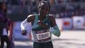 epa11699358 Kenya's Hellen Obiri crosses the finish line to win second place in the women's pro open race during the 2024 New York City Marathon in New York, New York, USA, 03 November 2024.  EPA/SARAH YENESEL