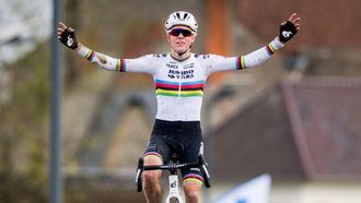 Dutch rider Fem Van Empel celebrates as she crosses the line to win the women's elite race at the 'Urban Cross Kortrijk' cyclocross cycling event, the second stage in the X2O Badkamers 'Trofee Veldrijden' competition, in Kortrijk on November 25, 2023. 
JASPER JACOBS / Belga / AFP