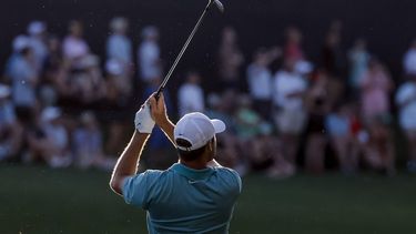epa12111523 Scottie Scheffler of the US hits from the fairway on the 18th hole during the third round of the 2025 PGA Championship golf tournament at the Quail Hollow Club in Charlotte, North Carolina, USA, 17 May 2025.  EPA/ERIK S. LESSER