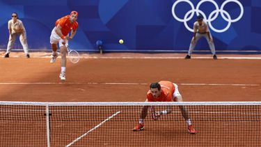 epa11509808 Tallon Griekspoor and Wesley Koolhof of the Netherlands in action during the Men's Doubles second round match against Rafael Nadal and Carlos Alcaraz of Spain at the Tennis competitions in the Paris 2024 Olympic Games, at the Roland Garros in Paris, France, 30 July 2024.  EPA/RITCHIE B. TONGO