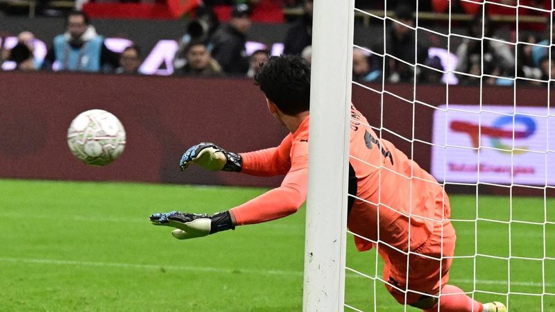 epa12649979 Morocco's goalkeeper Yassine Bounou makes a save during the penalty shootout of the CAF Africa Cup of Nations 2025, semifinal match between Nigeria and Morocco in Rabat, Morocco, 14 January 2026.  EPA/JALAL MORCHIDI