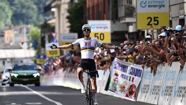Slovenia's rider Tadej Pogacar of team UAE Emirates - XRG celebrates as he crosses the finish line to win the first stage of the Men's Tour of Switzerland (Tour de Suisse) cycling race, in Sondrio, Italy, on June 17, 2026. 
Marco BERTORELLO / AFP