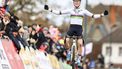 Dutch Fem Van Empel celebrates as she crosses the finish line to win the women's elite race at the 'CAPS Urban Cross Kortrijk' cyclocross cycling event, the fourth stage (out of 7) in the Exact Cross 2024-2025 competition in Kortrijk on November 23, 2024. 
DAVID PINTENS / Belga / AFP