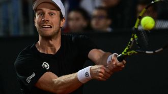 Dutch Botic van de Zandschulp returns to Canada's Felix Auger Aliassime during the Men's ATP Rome Open tennis tournament at Foro Italico in Rome on May 11, 2024.  
Tiziana FABI / AFP