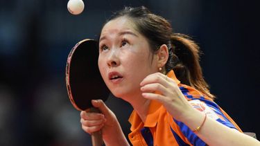 Netherlands' Jie Li serves the ball to Hungary's Bernadett Balint (unseen) on April 23, 2019 during their women's single match at the Liebherr 2019 ITTF World Table Tennis Championships in Budapest, Hungary. 
ATTILA KISBENEDEK / AFP