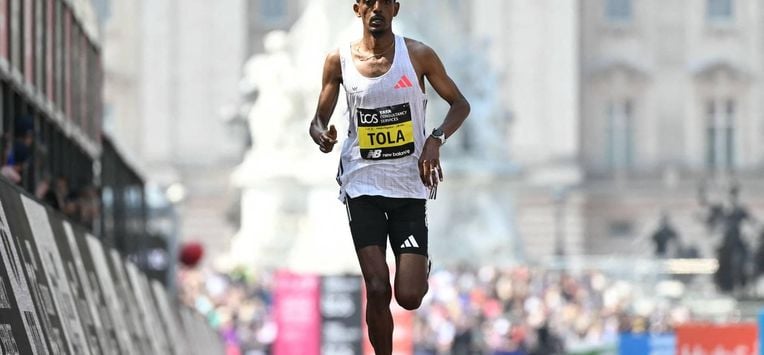 Ethiopia's Tamirat Tola runs to the line in fifth place in the men's race at the 2025 London Marathon in central London on April 27, 2025. 
JUSTIN TALLIS / AFP