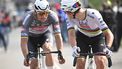 epa12029609 Slovenian rider Tadej Pogacar of UAE Team Emirates (R) competes in the Paris-Roubaix one-day cycling classic over 259.2km from Compiegne to Roubaix, France, 13 April 2025.  EPA/PAPON BERNARD / POOL