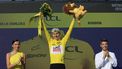epa11489475 Slovenian rider Tadej Pogacar of UAE Team Emirates celebrates in the overall leader's yellow jersey on the podium after winning the 20th stage of the 2024 Tour de France cycling race over 132km from Nice to Col de la Couillole, France, 20 July 2024.  EPA/GUILLAUME HORCAJUELO