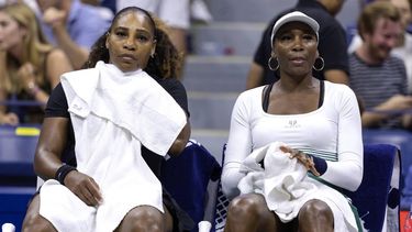 USA's Serena Williams (L) and Venus Williams sit on the bench between games as they play against Czech Republic's Lucie Hradecka and Linda Noskova during their 2022 US Open Tennis tournament women's doubles first round match at the USTA Billie Jean King National Tennis Center in New York, on September 1, 2022. 
COREY SIPKIN / AFP