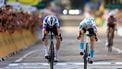 2023-07-21 17:03:47 epa10760376 Second placed Danish rider Kasper Asgreen (L) of team Soudal-Quick Step and first placed Slovenian rider Matej Mohoric (C) of team Bahrain-Victorious cross the finish line during the 19th stage of the Tour de France 2023, a 173kms race from Moirans-en-Montagne to Poligny, France, 21 July 2023.  EPA/MARTIN DIVISEK