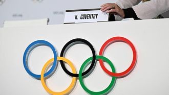A IOC staff member displays the name of newly-elected Zimbabwean Kirsty Coventry before her press conference as part of the 144th IOC Session on the day of the election of the President of the International Olympic Committee (IOC), in Costa Navarino, Greece on March 20, 2025. Zimbabwe's Kirsty Coventry became the first woman and the first African to be elected president of the International Olympic Committee on March 20, 2025.
Fabrice COFFRINI / AFP