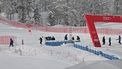 Technicians and security staff work in the finish area of the Women's Super G event of FIS Alpine Skiing World Cup in Val di Fassa, Italy on February 25, 2024.  The competition has been cancelled due to weather condition.
Andreas SOLARO / AFP