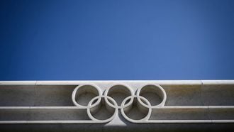The Olympic Rings logo is pictured in front of the headquarters of the International Olympic Committee (IOC) in Lausanne on March 18, 2020, as doubts increase over whether Tokyo can safely host the summer Games amid the spread of the COVID-19. Olympic chiefs acknowledged on March 18, 2020 there was no 