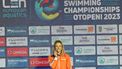 Gold medalist Kira Toussaint of the Netherlands celebrates on the podium during the European Short Course Swimming Championships in Otopeni, Bucharest, on December 8, 2023. 
Daniel MIHAILESCU / AFP