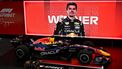 Red Bull Racing's Dutch driver Max Verstappen looks inside the cockpit after winning the sprint race ahead of the Formula One Singapore Grand Prix at the Marina Bay Street Circuit in Singapore on October 10, 2026. 
ANTHONY WALLACE / AFP
