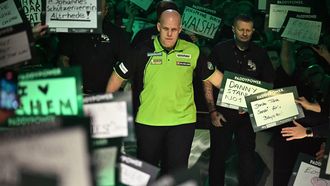 Netherlands' Michael van Gerwen makes his way to the stage ahead of playing against England's Luke Littler in the PDC World Darts Championship final, at Alexandra Palace in London on January 3, 2025. 
Ben STANSALL / AFP