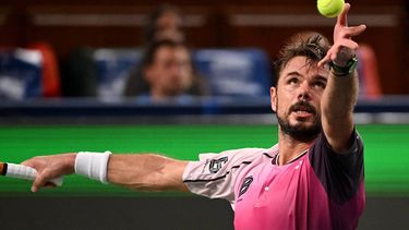 Switzerland’s Stan Wawrinka serves to Hungary’s Fabian Marozsan in their men's singles match at the Shanghai Masters tennis tournament in Shanghai on October 1, 2025. 
Jade Gao / AFP