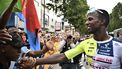 Intermarche - Wanty team's Eritrean rider Biniam Girmay celebrates with supporters after winning the 3rd stage of the 111th edition of the Tour de France cycling race, 230,5 km between Piacenza and Turin, in Italy, on July 1, 2024. 
Marco BERTORELLO / AFP