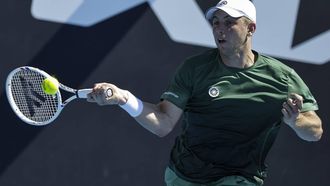 epa11822898 Tallon Griekspoor of the Netherlands in action against Hubert Hurkacz of Poland during their Men's first round match during the Australian Open tennis tournament in Melbourne, Australia, 14 January 2025.  EPA/ROLEX DELA PENA