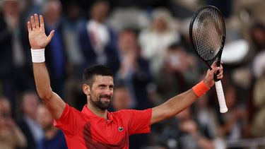Serbia's Novak Djokovic celebrates after winning his men's singles match against US Mackenzie Mcdonald on day 3 of the French Open tennis tournament on Court Philippe-Chatrier at the Roland-Garros Complex in Paris on May 27, 2025. 
Franck FIFE / AFP