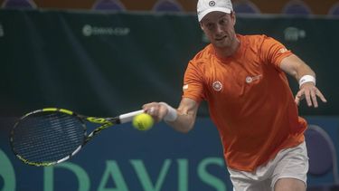 2023-09-17 14:55:38 epa10866236 Botic Van de Zandschulp of Netherlands in action against Duje Ajdukovic of Croatia during the Davis Cup Group D match between Netherlands and Croatia in Split, Croatia, 17 September 2023.  EPA/STRINGER