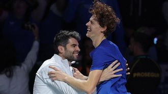 2023-11-26 20:39:42 Italy's Jannik Sinner (R) and Simone Bolelli celebrate winning the Davis Cup tennis tournament after beating Australia's Alex de Minaur in the second men's singles final tennis match at the Martin Carpena sportshall, in Malaga on November 26, 2023. 
LLUIS GENE / AFP