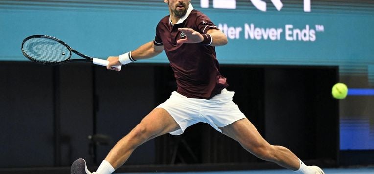 Serbia’s Novak Djokovic hits a return to Australia’s Alex de Minaur during the men’s singles final at the China Open tennis tournament in Beijing on October 6, 2026. 
Greg Baker / AFP