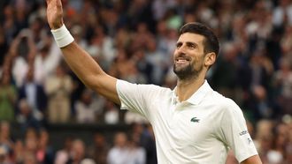 2023-07-14 16:26:16 epa10746236 Novak Djokovic of Serbia celebrates winning his Men's Singles semi-final match against Jannik Sinnner of Italy at the Wimbledon Championships, Wimbledon, Britain, 14 July 2023.  EPA/NEIL HALL   EDITORIAL USE ONLY  EDITORIAL USE ONLY