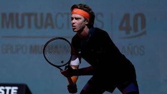 Russia’s Andrey Rublev prepares to play a return against Kazakstan’s Alexander Bublik during their 2025 ATP Tour Madrid Open tennis tournament third round singles match at the Caja Magica in Madrid, on April 27, 2025. 
Thomas COEX / AFP