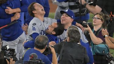 epa12498536 Los Angeles Dodgers pitcher Yoshinobu Yamamoto (L) celebrates with his teammates after the final out as the Dodgers defeated the Toronto Blue Jays during the bottom of the 11th inning to win the MLB World Series in game seven in Toronto, Canada, 01 November 2025. Yamamoto was named 2025 World Series MVP.  EPA/EDUARDO LIMA