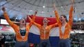 (L-R) Netherlands' #123 Steffie Van der Peet, #122 Hetty Van de Wouw and #121 Kimberly Kalee celebrate after winning the women's team sprint final at the 2025 UCI Track World Championships, in the Penalolen Velodrome in Santiago, on October 22, 2025. 
Javier TORRES / AFP