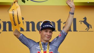 epa11468379 Belgian rider Jasper Philipsen of Alpecin - Deceuninck celebrates on the podium after winning the tenth stage of the 2024 Tour de France cycling race over 187km from Orleans to Saint-Amand-Montrond, France, 09 July 2024.  EPA/KIM LUDBROOK