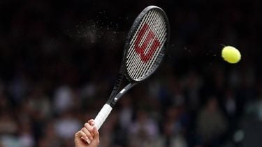 epa07716911 Roger Federer of Switzerland serves to Novak Djokovic of Serbia in the men's final of the Wimbledon Championships at the All England Lawn Tennis Club, in London, Britain, 14 July 2019. EPA/NIC BOTHMA EDITORIAL USE ONLY/NO COMMERCIAL SALES