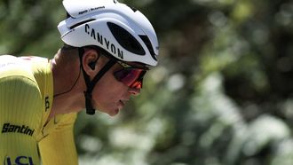 Alpecin - Deceuninck team's Dutch rider Mathieu van der Poel wearing the overall leader's yellow jersey cycles with the pack of riders (peloton) during the 7th stage of the 112th edition of the Tour de France cycling race, 197 km between Saint-Malo and Mur-de-Bretagne Guerledan, in Brittany, western France, on July 11, 2025. 
Anne-Christine POUJOULAT / AFP