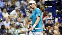 Netherlands' Botic van De Zandschulp reacts after a point won against Spain's Carlos Alcaraz during their men's singles second round tennis match on day four of the US Open tennis tournament at the USTA Billie Jean King National Tennis Center in New York City, on August 29, 2024. 
CHARLY TRIBALLEAU / AFP