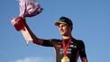 Team Visma-Lease a Bike's Dutch rider Olav Kooij celebrates on the podium after winning the 21st and last stage of the 108th Giro d'Italia cycling race of 143kms from Rome to Rome on June 1, 2025. 
Luca Bettini / AFP