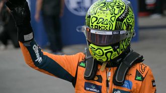 McLaren's British driver Lando Norris celebrates after getting the pole position during the qualifying session of the Sao Paulo Formula One Grand Prix at the Jose Carlos Pace racetrack, aka Interlagos, in Sao Paulo, Brazil on November 8, 2025. 
Nelson ALMEIDA / AFP