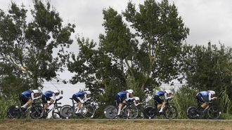 Team Israel Premier Tech 's riders compete during the fifth stage of La Vuelta a Espana cycling tour, a 24.1 km time-trial team race in Figueres, on August 27, 2025.   
Josep LAGO / AFP