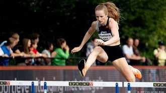 2023-07-29 18:48:39 BREDA - Cathelijn Peeters tijdens de finale 400 meter horde op de tweede dag van het NK atletiek op de baan van AV Sprint. ANP IRIS VAN DEN BROEK