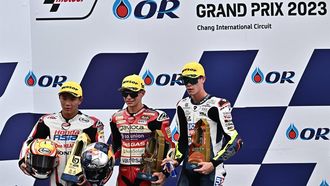 2023-10-29 06:52:22 (LtoR) Second-placed Honda Team Asia's Japanese rider Taiyo Furusato, winner Gaviota GASGAS Aspar's Colombian rider David Alonso and third-placed Liqui Moly Husqvarna Intact's Dutch rider Collin Veijer pose on the podium after competing in the Moto3 class race of the MotoGP Thailand Grand Prix at the Buriram International Circuit in Buriram on October 29, 2023. 
Lillian SUWANRUMPHA / AFP