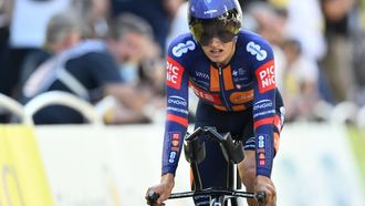 Team Picnic PostNL team's British rider Oscar Onley cycles to the finish line of the 5th stage of the 112th edition of the Tour de France cycling race, 33 km individual time trial starting and finishing in Caen, northwestern France, on July 9, 2025. 
Marco BERTORELLO / AFP