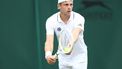 2023-07-04 12:08:34 epa10725549 Tallon Griekspoor of Netherlands serves during his 1st round match against Marton Fucsovics of Hungary at the Wimbledon Championships, Wimbledon, Britain, 04 July 2023  EPA/ADAM VAUGHAN   EDITORIAL USE ONLY