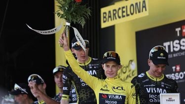 Team Visma | Lease a Bike's Danish rider Jonas Vingegaard celebrates on the podium with the overall leader's yellow jersey after the 1st stage of the 113th edition of the Tour de France cycling race, a 19 km team time trial stage in and around Barcelona in northeastern Spain, on July 4, 2026. 
Anne-Christine POUJOULAT / AFP