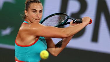 Belarus' Aryna Sabalenka plays a backhand return to Russia's Kamilla Rakhimova during their women's singles match on day 1 of the French Open tennis tournament on Court Philippe-Chatrier at the Roland-Garros Complex in Paris on May 25, 2025. 
Alain JOCARD / AFP