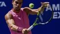 Spain's Carlos Alcaraz plays a backhand return to Czech Republic’s Jiri Lehecka during their men's singles quarterfinal tennis match on day ten of the US Open tennis tournament at the USTA Billie Jean King National Tennis Center in New York City, on September 2, 2025. 
Kena Betancur / AFP