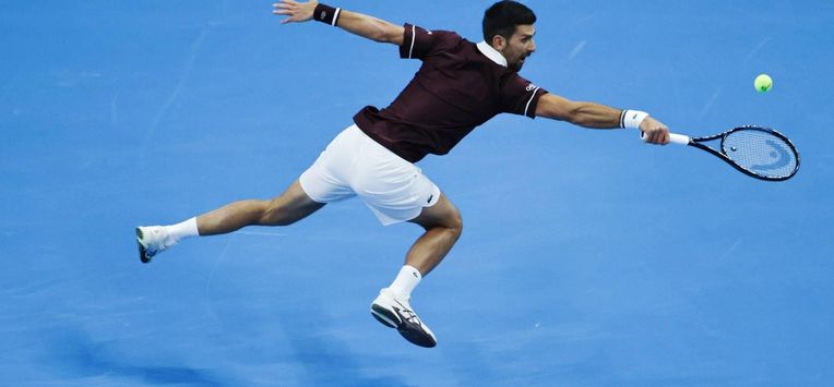 epa13280491 Novak Djokovic of Serbia  Alexander Zverev of Germany in action during his men’s singles quarterfinals match against Alexander Zverev of Germany at the China Open tennis tournament in Beijing, China, 04 October 2026.  EPA/ANDRES MARTINEZ CASARES